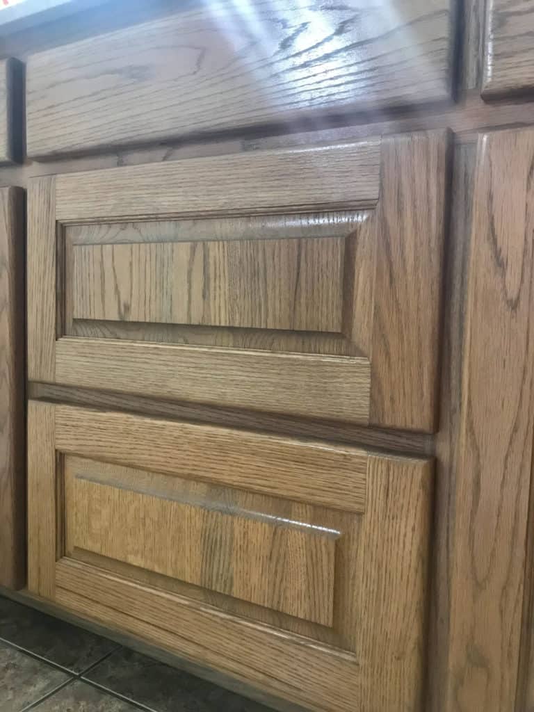 How to update old wood kitchen cabinets-no painting