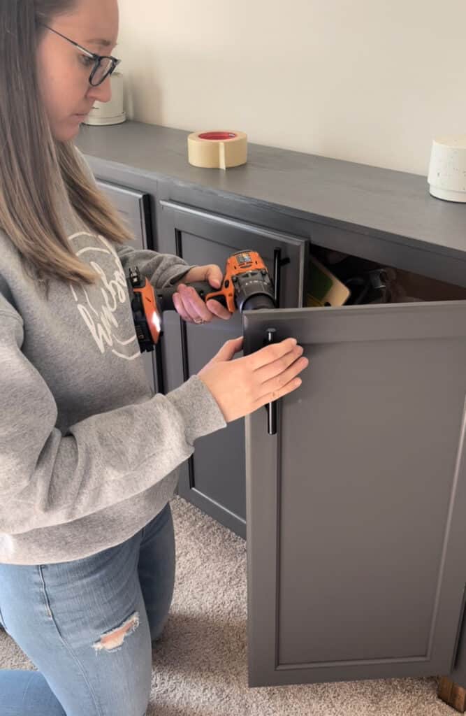 Installing hardware on cabinet