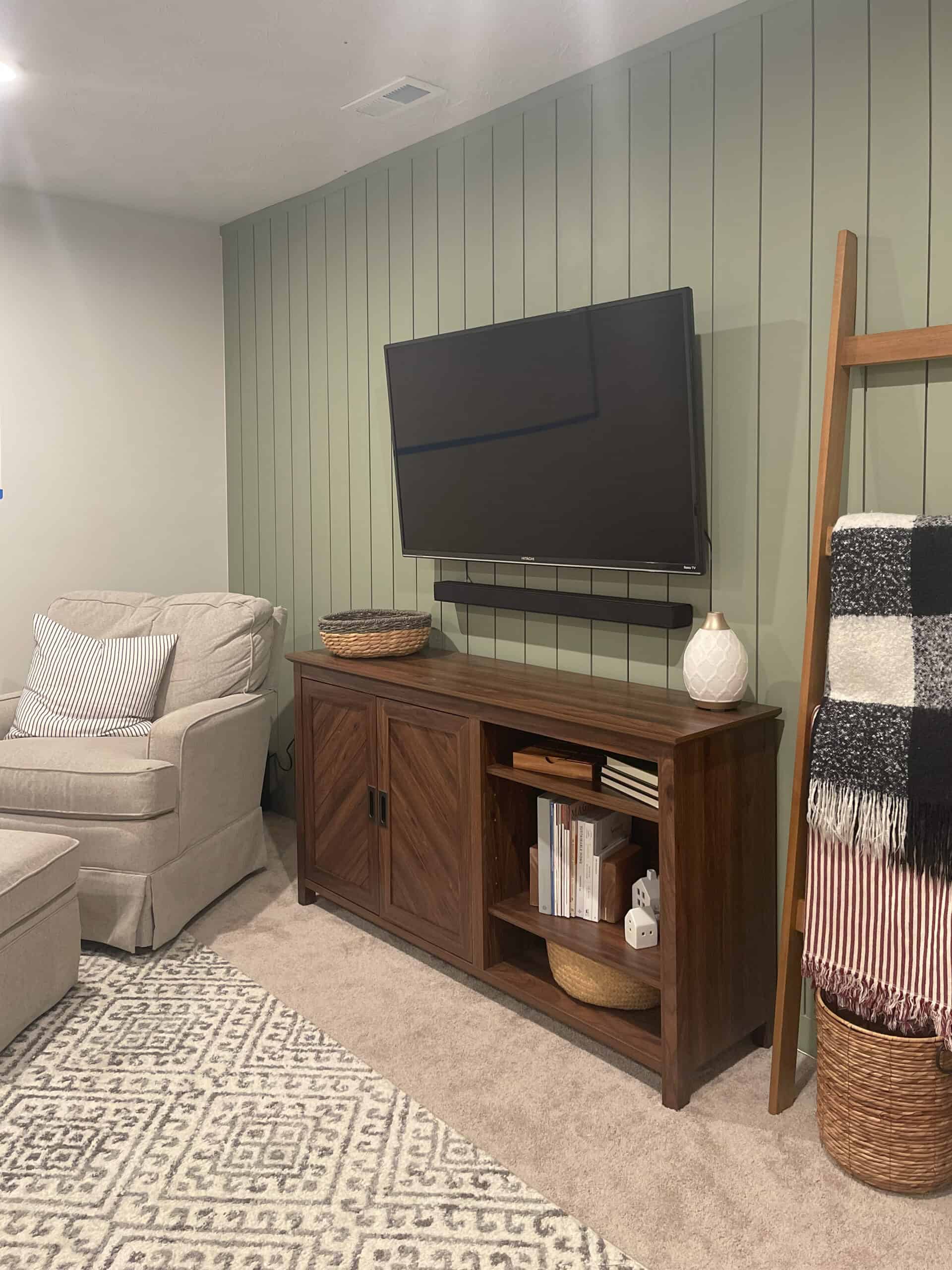 Painting Tools Must Haves-A angled brush and roller was essential for painting this Green basement accent wall. 