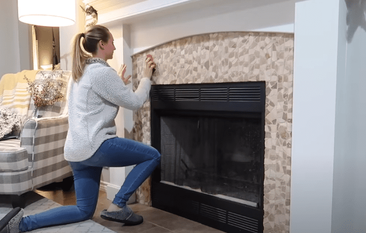 Sanding outdated stone fireplace. Painting stone fireplace ideas