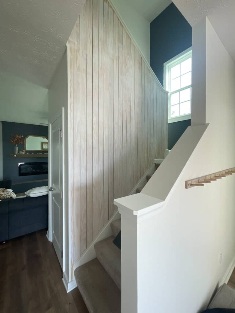 MDF vs wood. Wood skinny shiplap in our stairwell. 