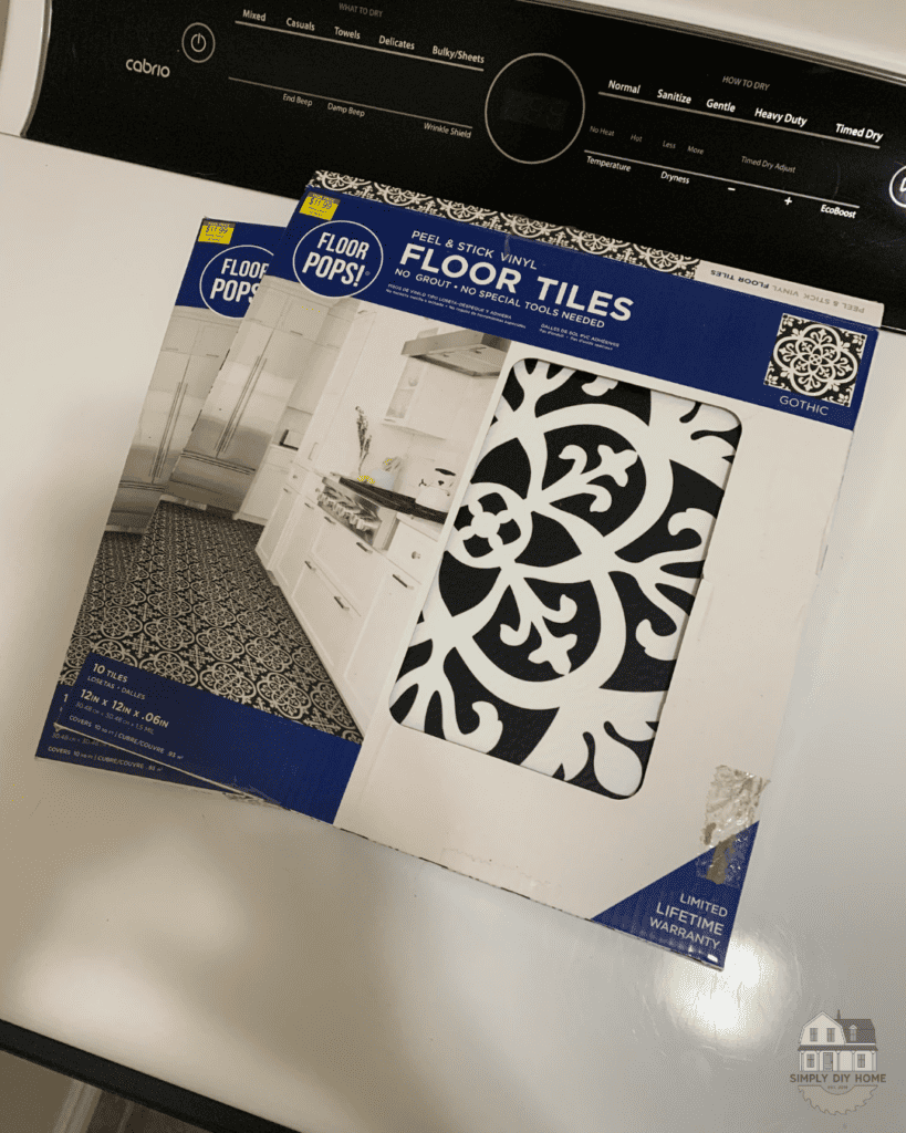 Box of peel and stick tiles.